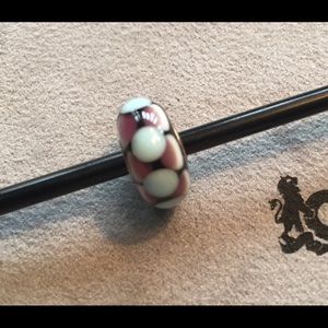 Trollbeads “Dolly” glass bead with silver core.